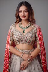 The Imperial Silver Tissue Pleated Lehenga with Coordinated Zardosi Blouse and Handcrafted Gaji Bandhej Patchwork Dupatta