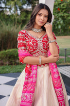 The Cream Silk Paithani Border Lehenga with Peacock Motif Gota Choli and Pink Gaji Bandhej Dupatta