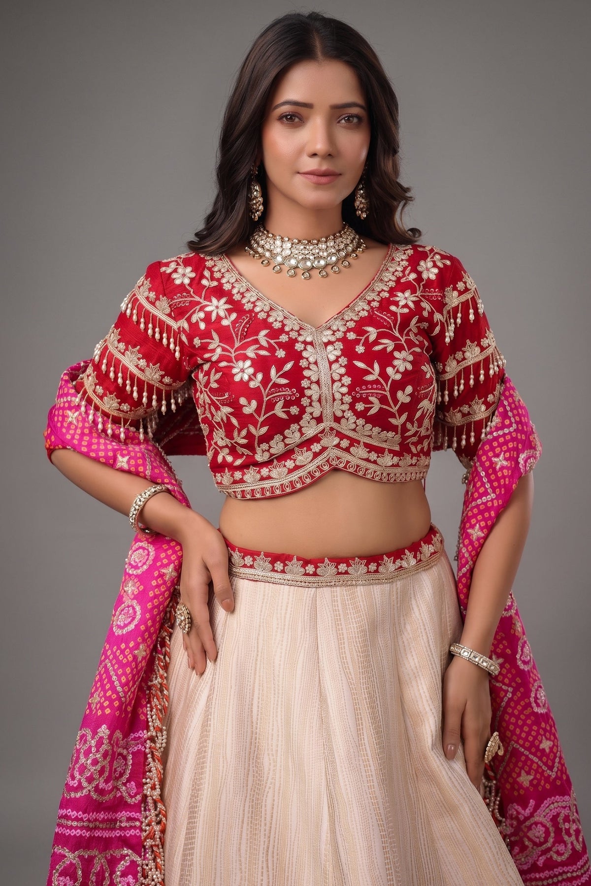 The Cream Silk Paithani Border Lehenga with Peacock Motif Gota Choli and Pink Gaji Bandhej Dupatta
