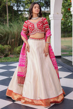 The Cream Silk Paithani Border Lehenga with Peacock Motif Gota Choli and Pink Gaji Bandhej Dupatta
