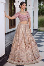 The Onion Pink Banarasi Brocade Silk Lehenga with Scalloped Crossover Choli and Handwork