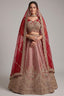 The Majestic Maroon Banarasi Silk Bridal Lehenga Ensemble with Jharokha Zardosi Blouse and Sheer Scalloped Veil