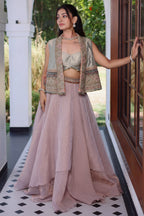 Muted Mauve Tissue Asymmetric Layered Lehenga Set With Heavily Embroidered Fusion Jacket
