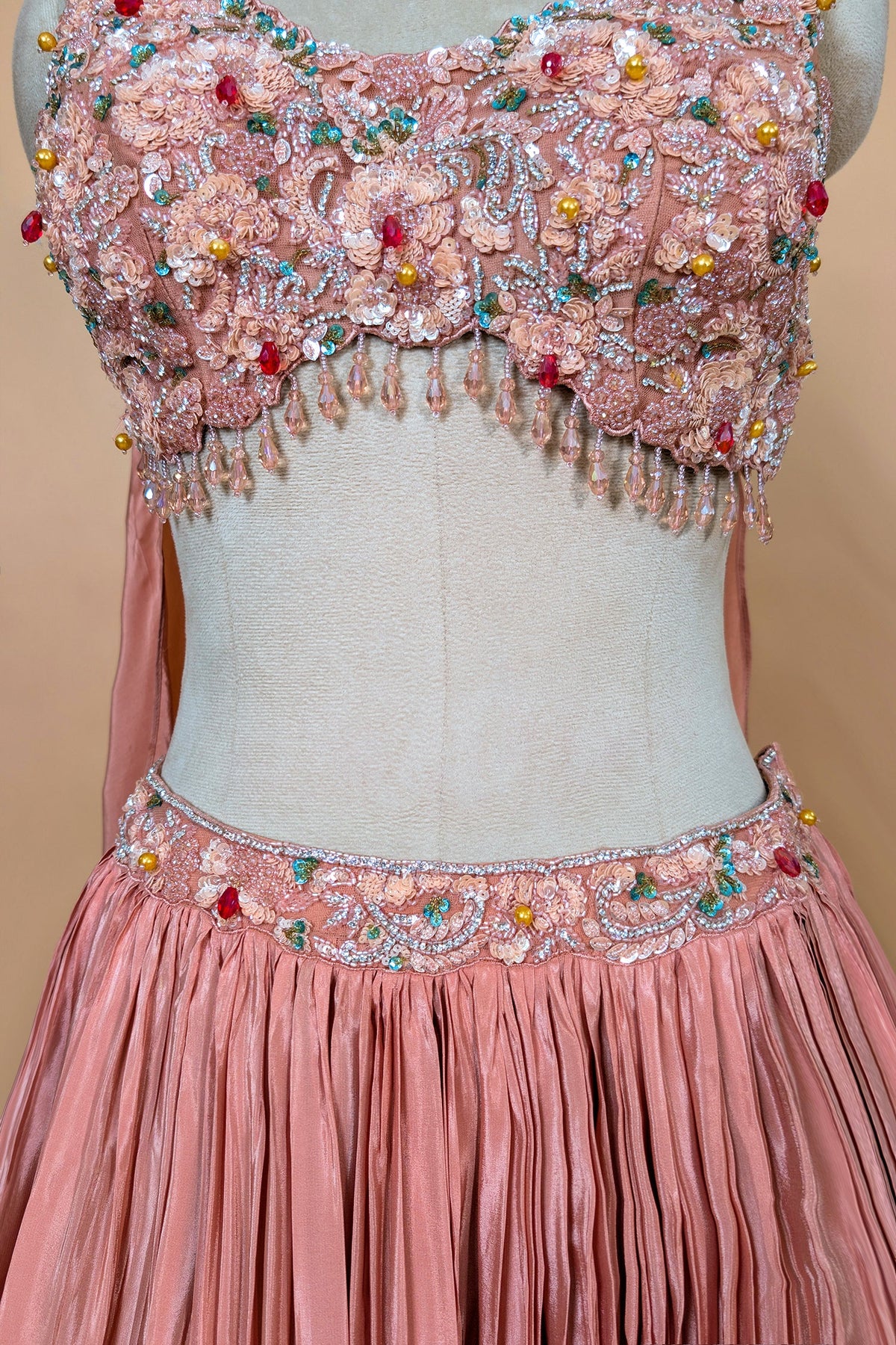 Dusty Rose Chinon Crepe Silk Crush Lehenga with Encrusted Cutdana Bustier Choli