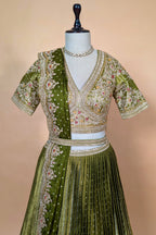 Moss Green Banarasi Silk Accordion-Pleated Lehenga Skirt with Encrusted Dabka-Zardosi Blouse