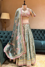 Mint Green Tissue Zari Woven Flared Lehenga with Multi-Textured Lace and Pearl Bustier