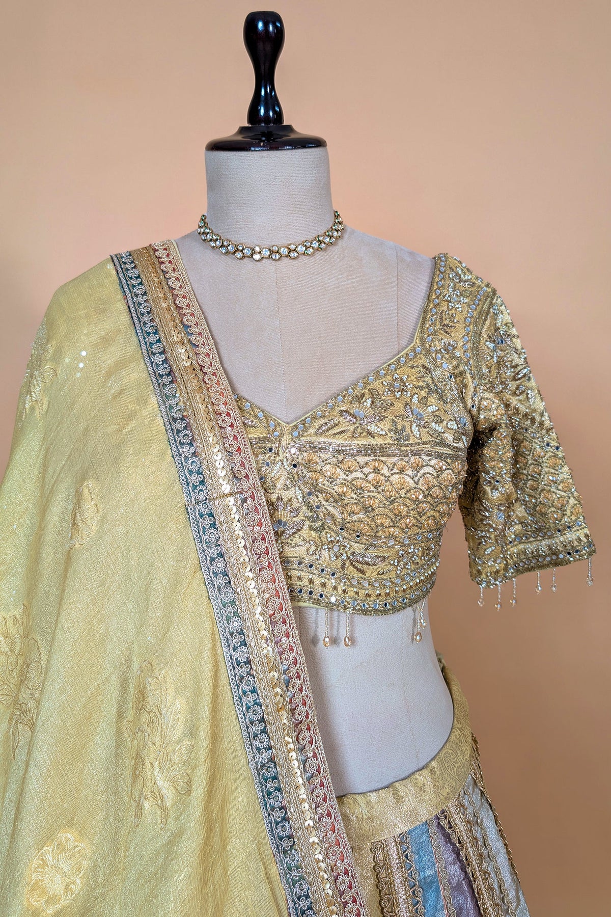 Multi Colored Kalidaar Metallic Tissue Silk Lehenga Set with Encrusted Cutdana-Mirror Work Blouse