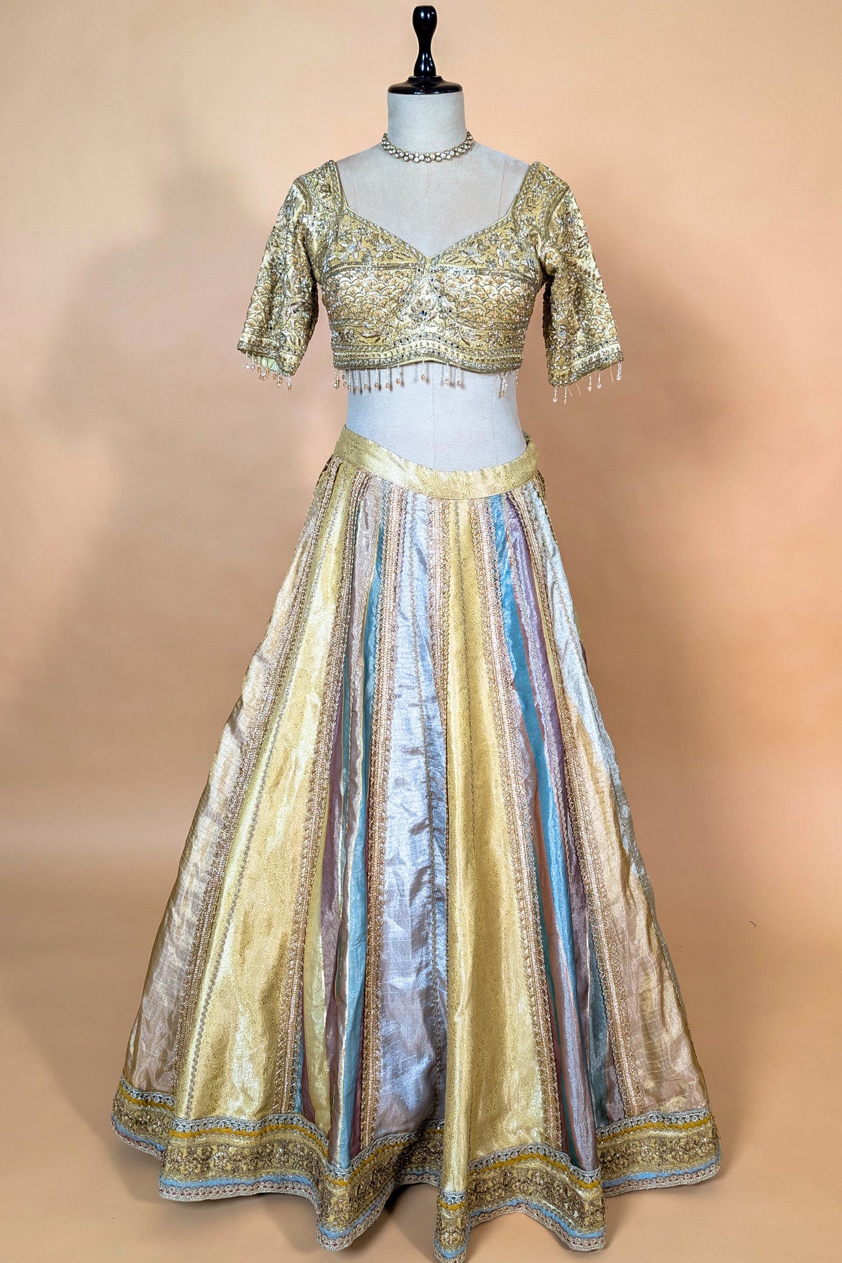 Multi Colored Kalidaar Metallic Tissue Silk Lehenga Set with Encrusted Cutdana-Mirror Work Blouse