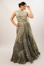 Metallic Green Smocked Satin Lehenga Set with Mirror-Embellished High-Neck Blouse
