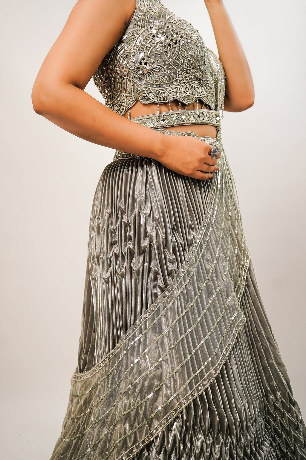 Metallic Green Smocked Satin Lehenga Set with Mirror-Embellished High-Neck Blouse