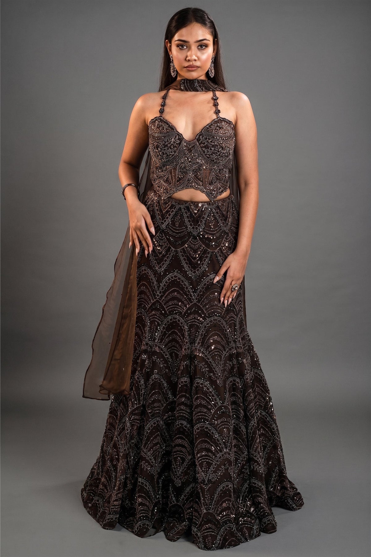 Charcoal Brown Net Lehenga Set with Wave-Patterned Cutdana and Sequin Sweetheart Bustier