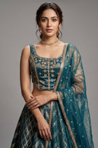 Green Tissue Woven Lehenga with Sequin Beaded Corset Blouse
