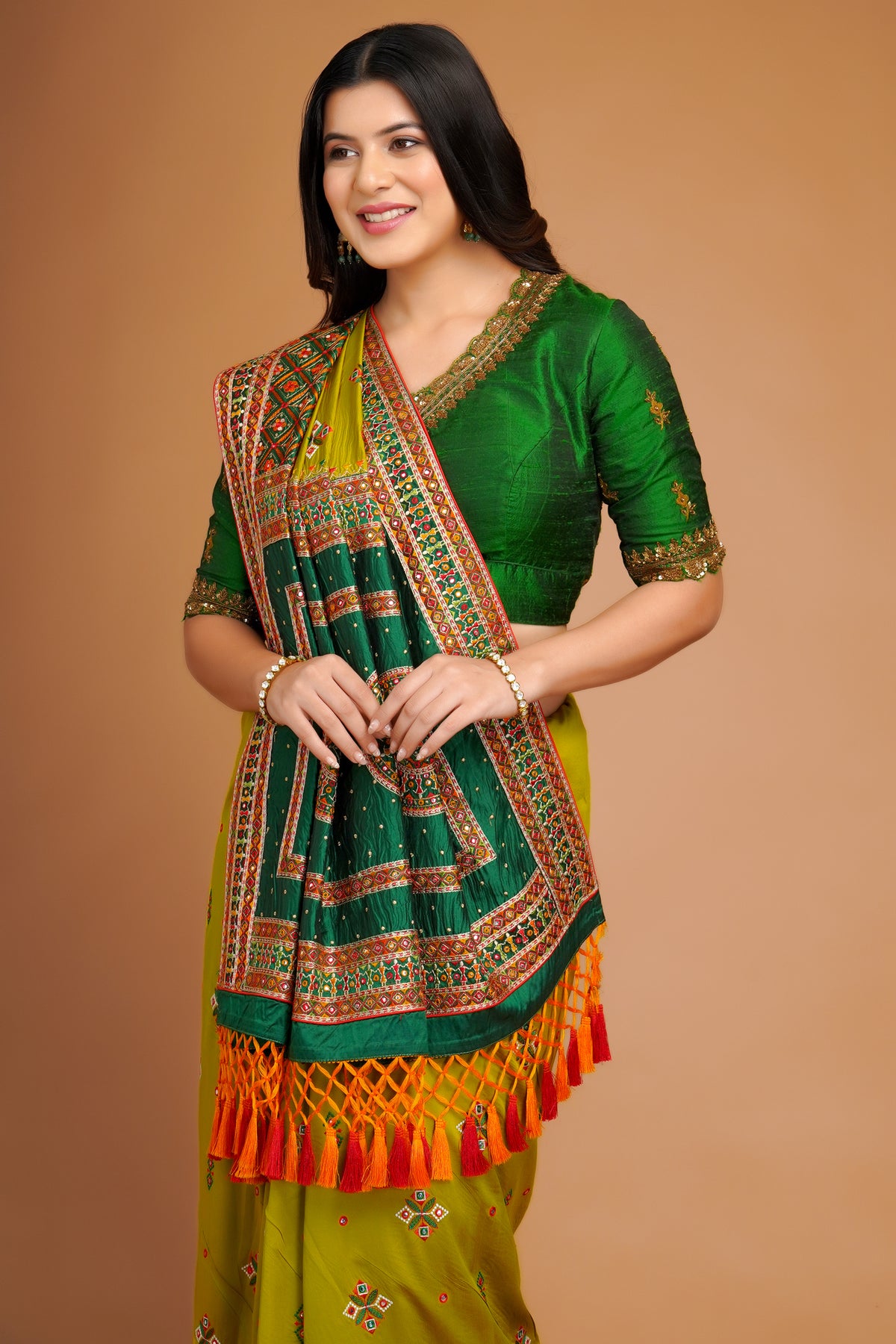 Olive Green Silk Broad Embroidered Border Saree with Tassels