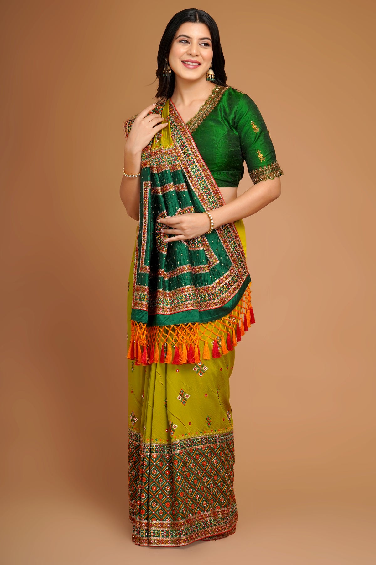 Olive Green Silk Broad Embroidered Border Saree with Tassels