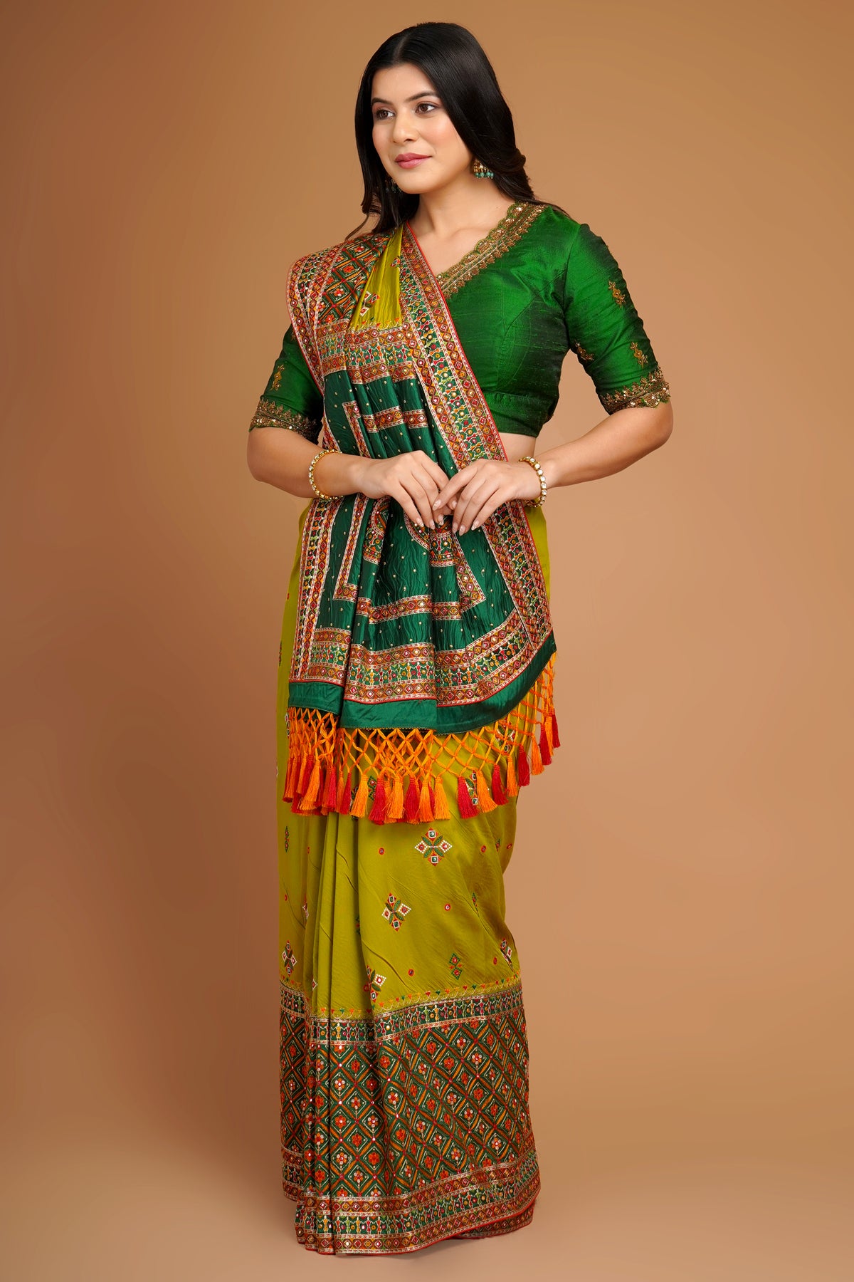 Olive Green Silk Broad Embroidered Border Saree with Tassels