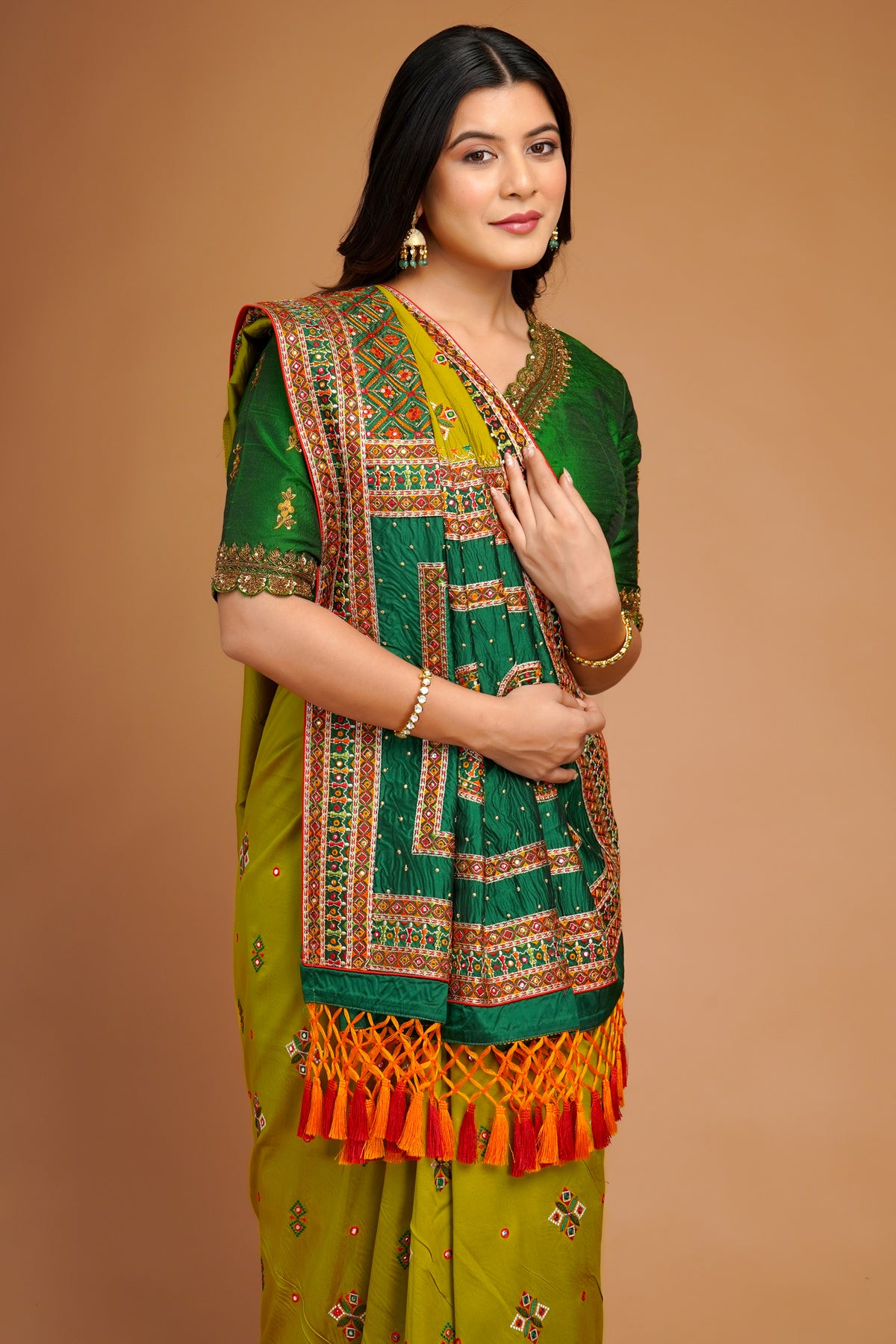 Olive Green Silk Broad Embroidered Border Saree with Tassels