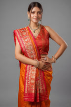 Orange Banarasi Silk Traditional Saree with Contrast Broad Patola Border