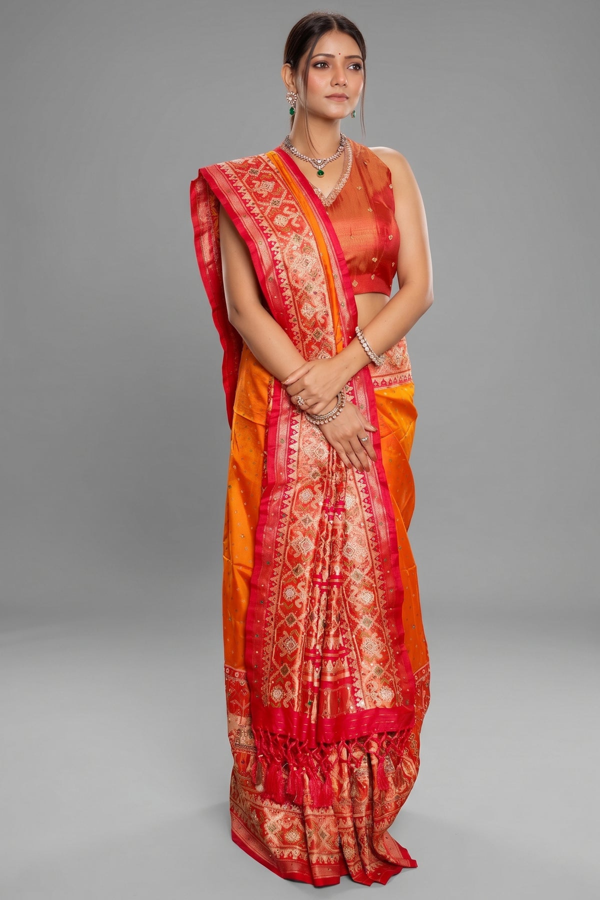 Orange Banarasi Silk Traditional Saree with Contrast Broad Patola Border