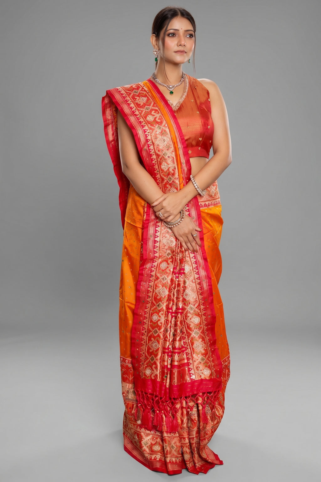 Orange Banarasi Silk Traditional Saree with Contrast Broad Patola Border