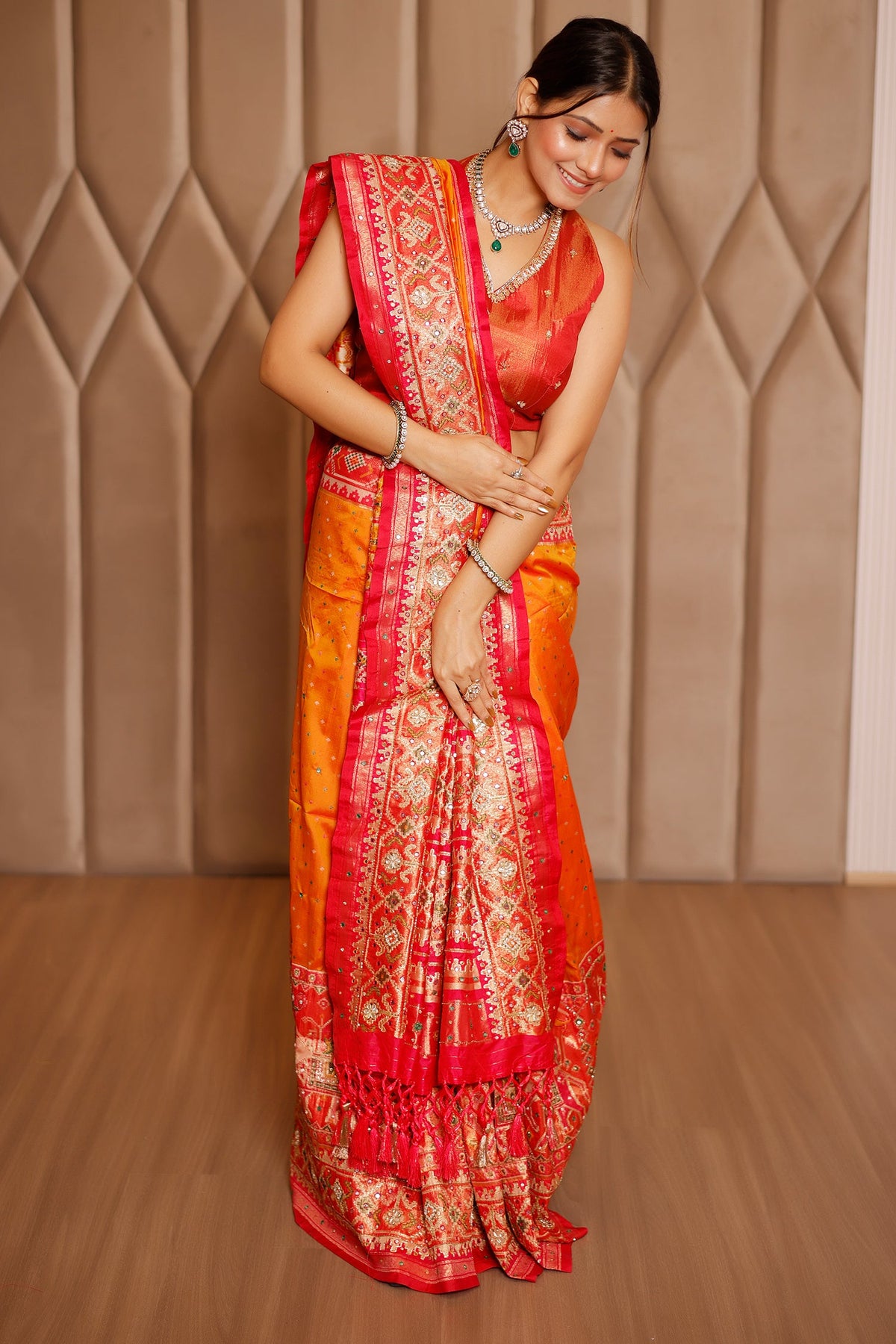 Orange Banarasi Silk Traditional Saree with Contrast Broad Patola Border