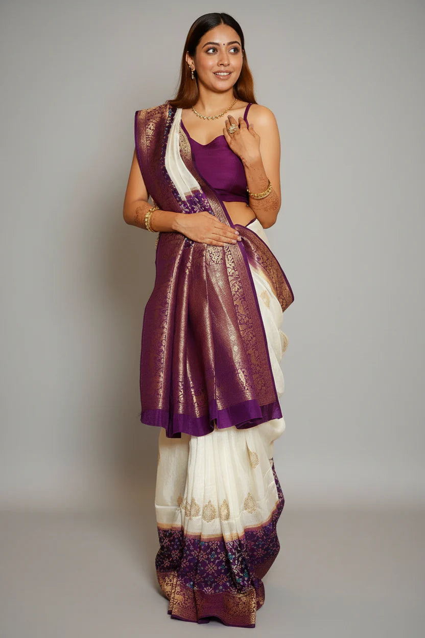 Off White Dola Silk Saree with Contrast Patola Border