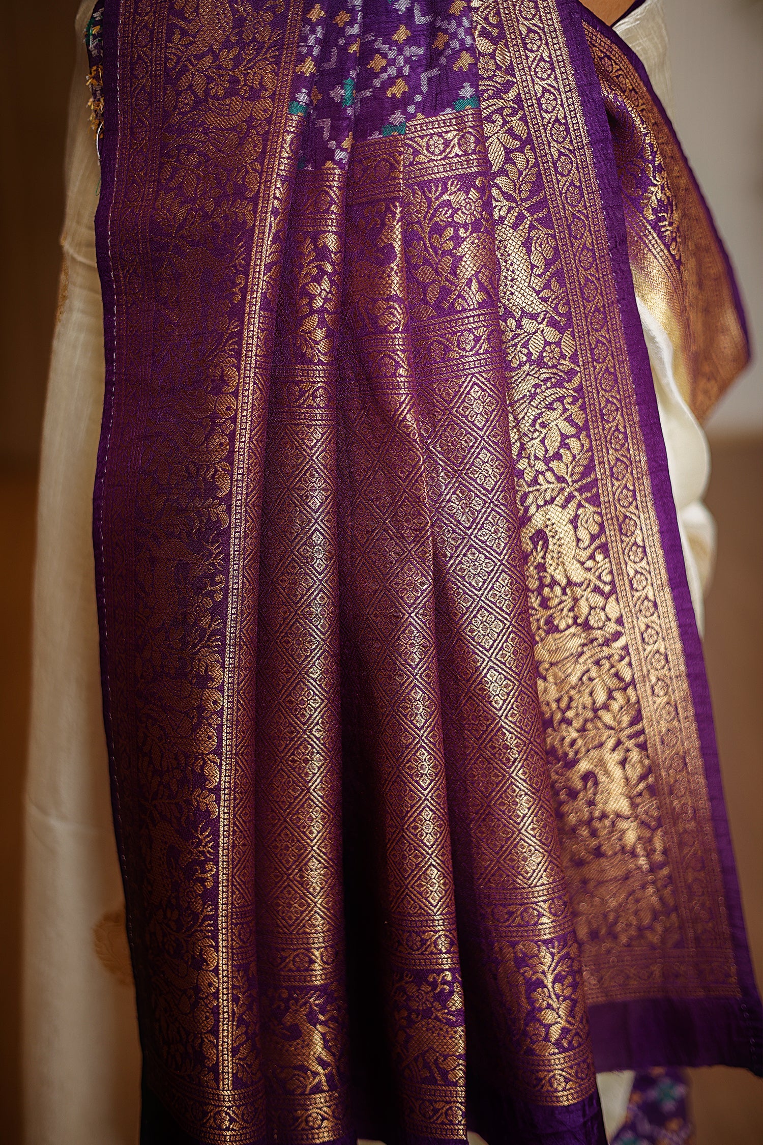Off White Dola Silk Saree with Contrast Patola Border