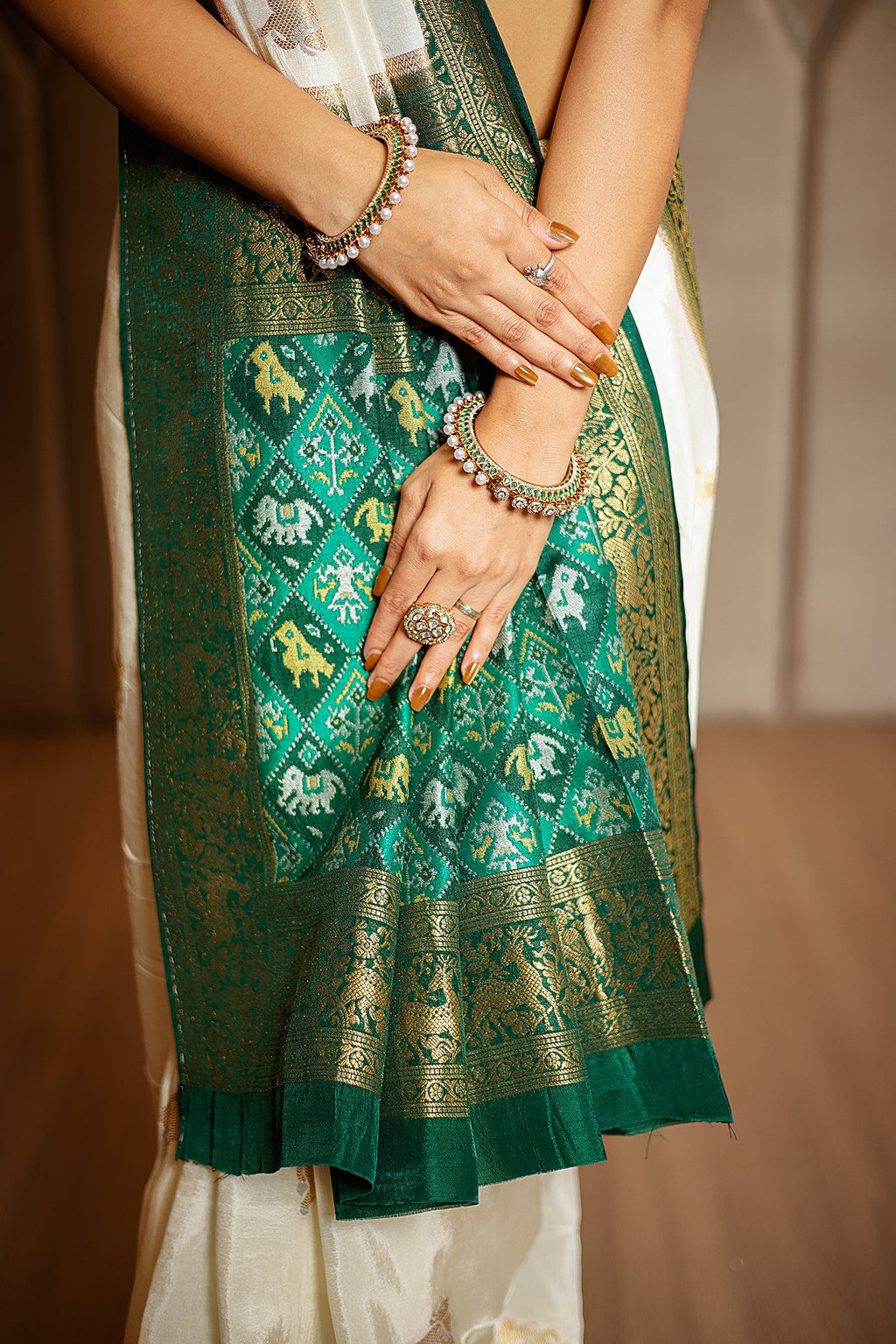 Off White Dola Silk Woven Butta Saree with Contrast Woven Border and Patola Pallu