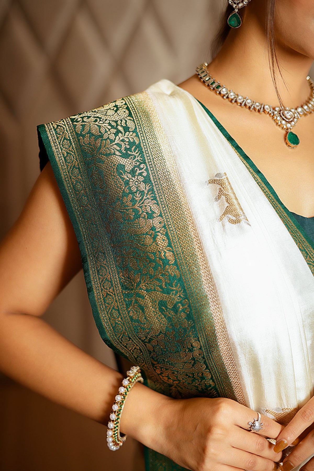 Off White Dola Silk Woven Butta Saree with Contrast Woven Border and Patola Pallu