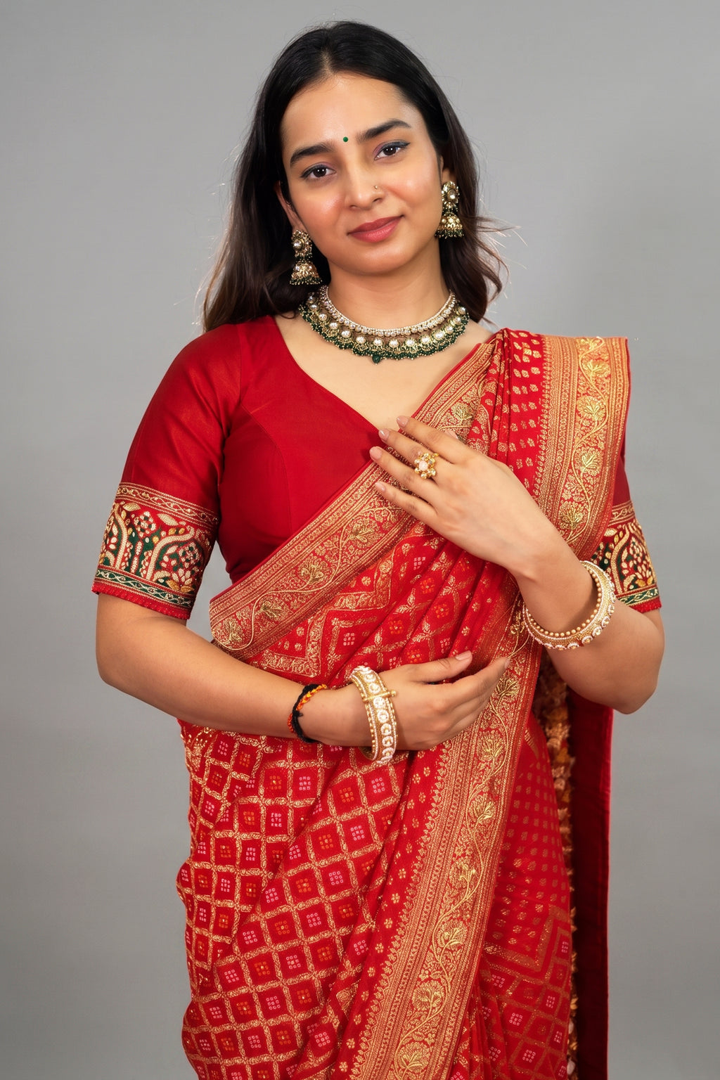 Red Georgette Traditional Bandhej Saree with Cutdana and Bead Work