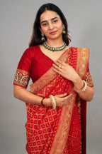 Red Georgette Traditional Bandhej Saree with Cutdana and Bead Work
