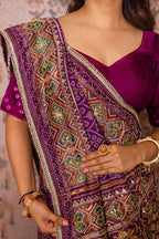 Purple Silk Traditional Woven Patola Saree with Cutdana and Beads Work