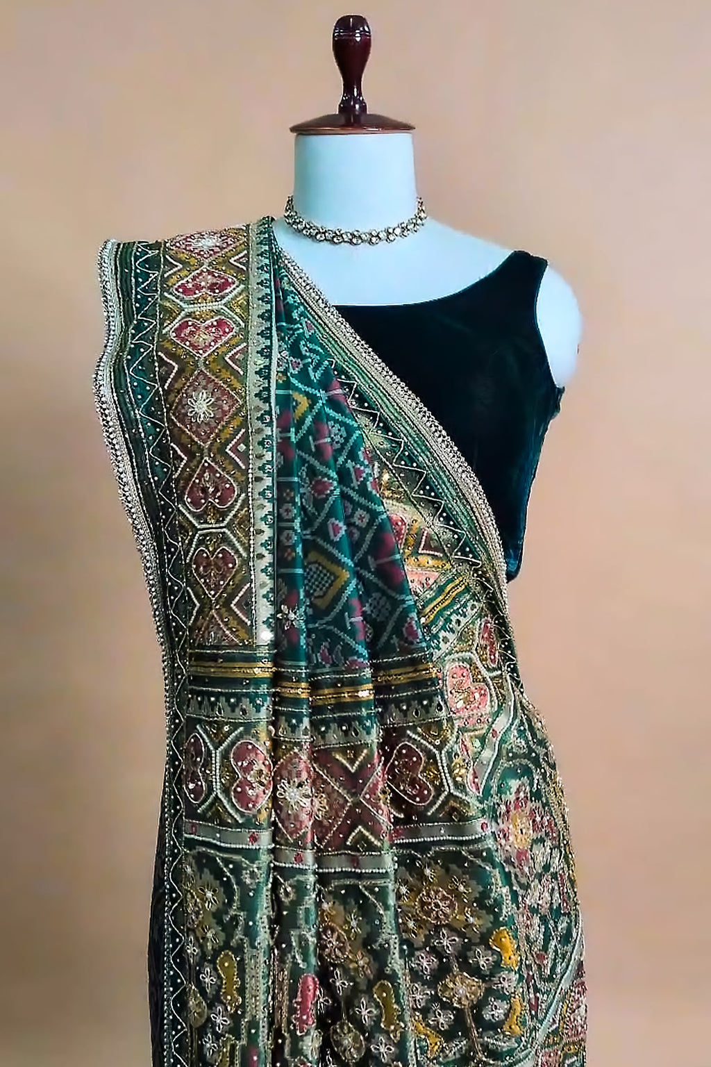 Green Silk Traditional Woven Patola Saree with Cutdana and Beads Work