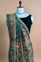 Green Silk Traditional Woven Patola Saree with Cutdana and Beads Work