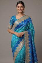 Turquoise Blue Silk Patola Saree with Zardosi Sequin Worked Scallop Border