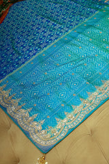 Turquoise Blue Silk Patola Saree with Zardosi Sequin Worked Scallop Border