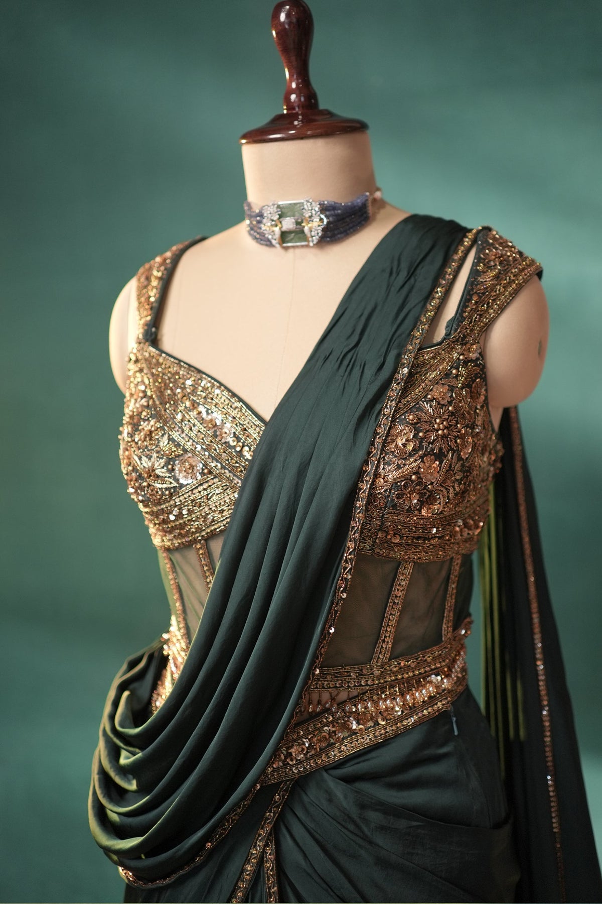 Bottle Green Crepe Satin Silk Pre Draped Lehenga Style Saree with Embellished Corset