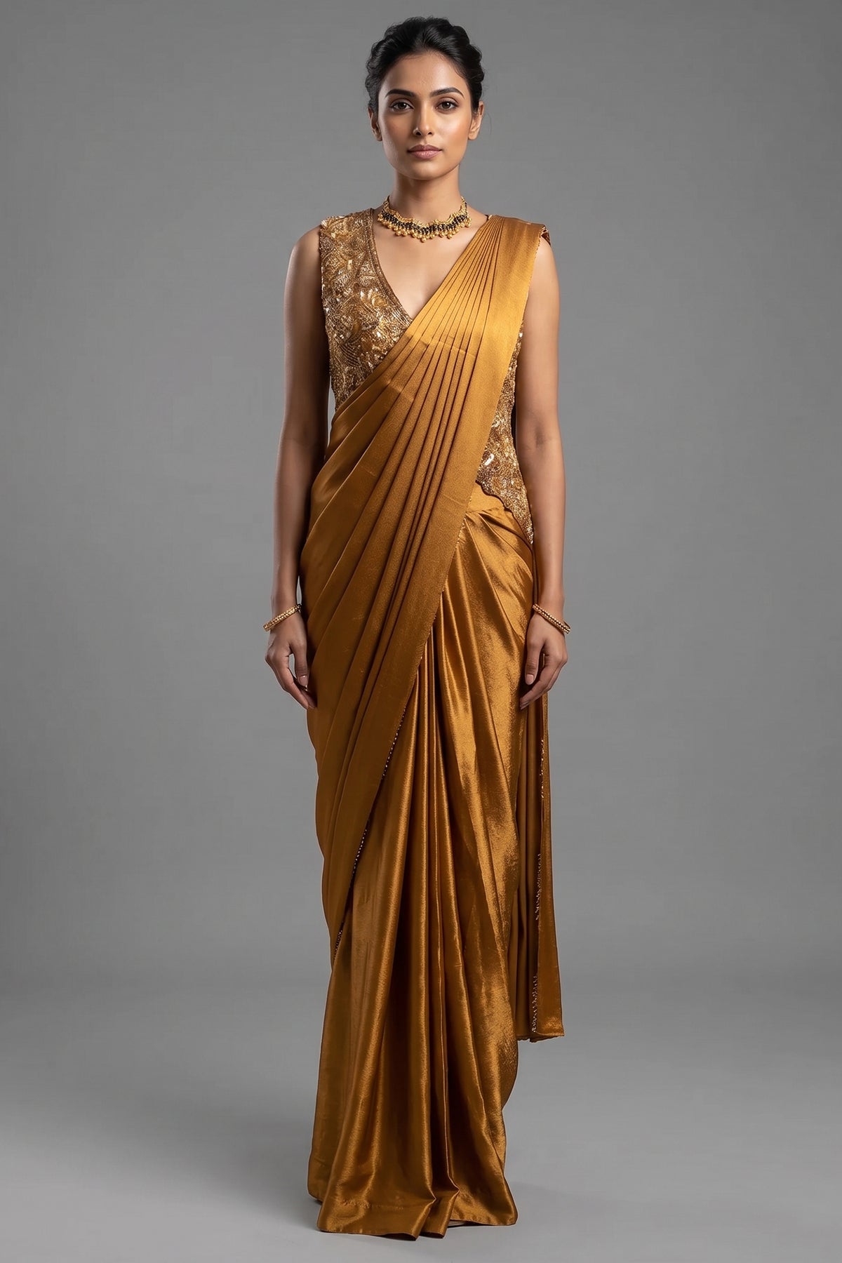 Golden Satin Silk Pre Draped Saree with Cutdana and Pearl Worked Jacket