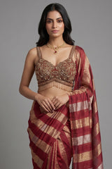 Maroon and Gold Striped Saree with Heavily Embellished Blouse