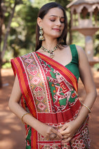 Green Silk Traditional Patola Saree with Beaded Work