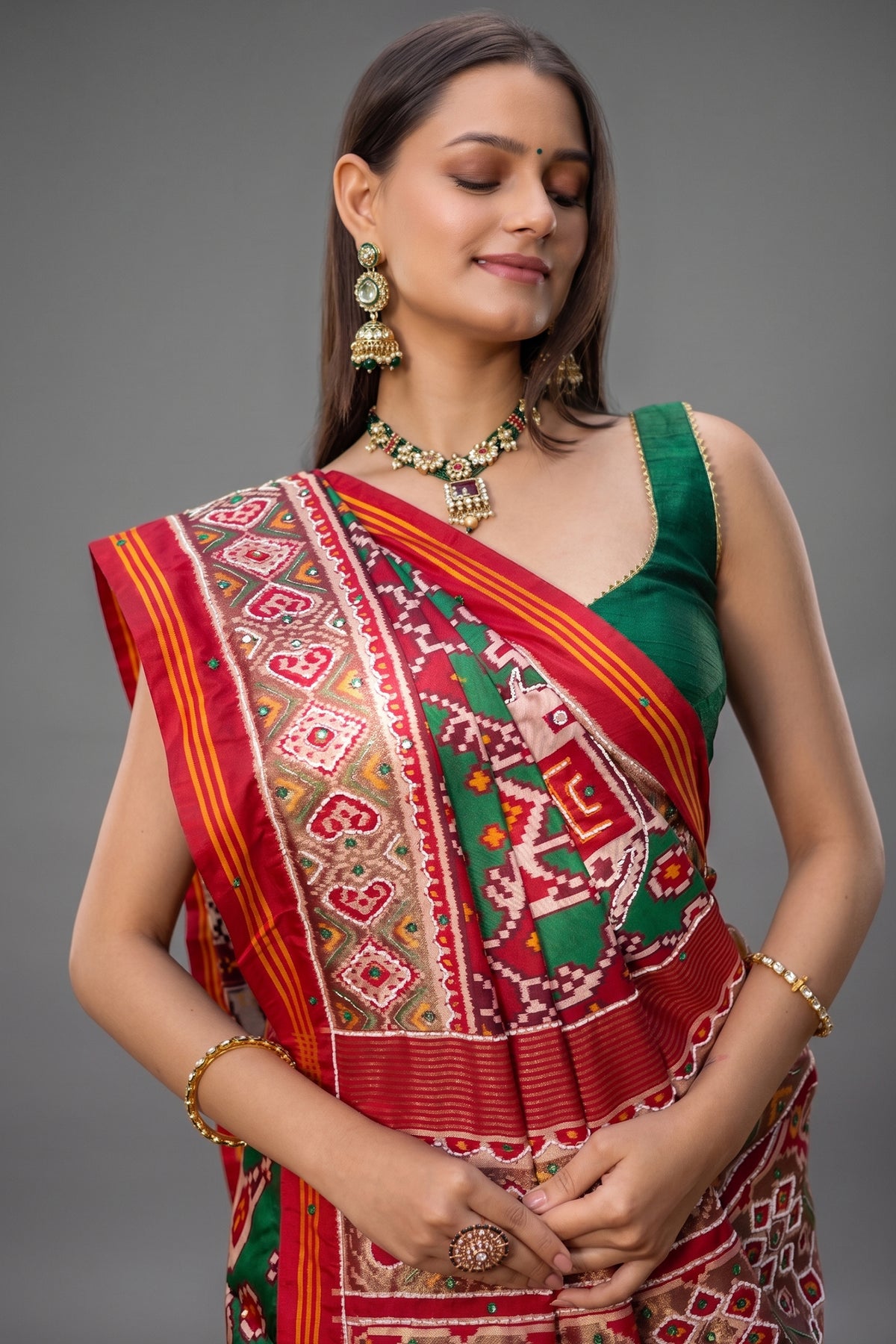 Green Silk Traditional Patola Saree with Beaded Work