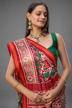 Green Silk Traditional Patola Saree with Beaded Work