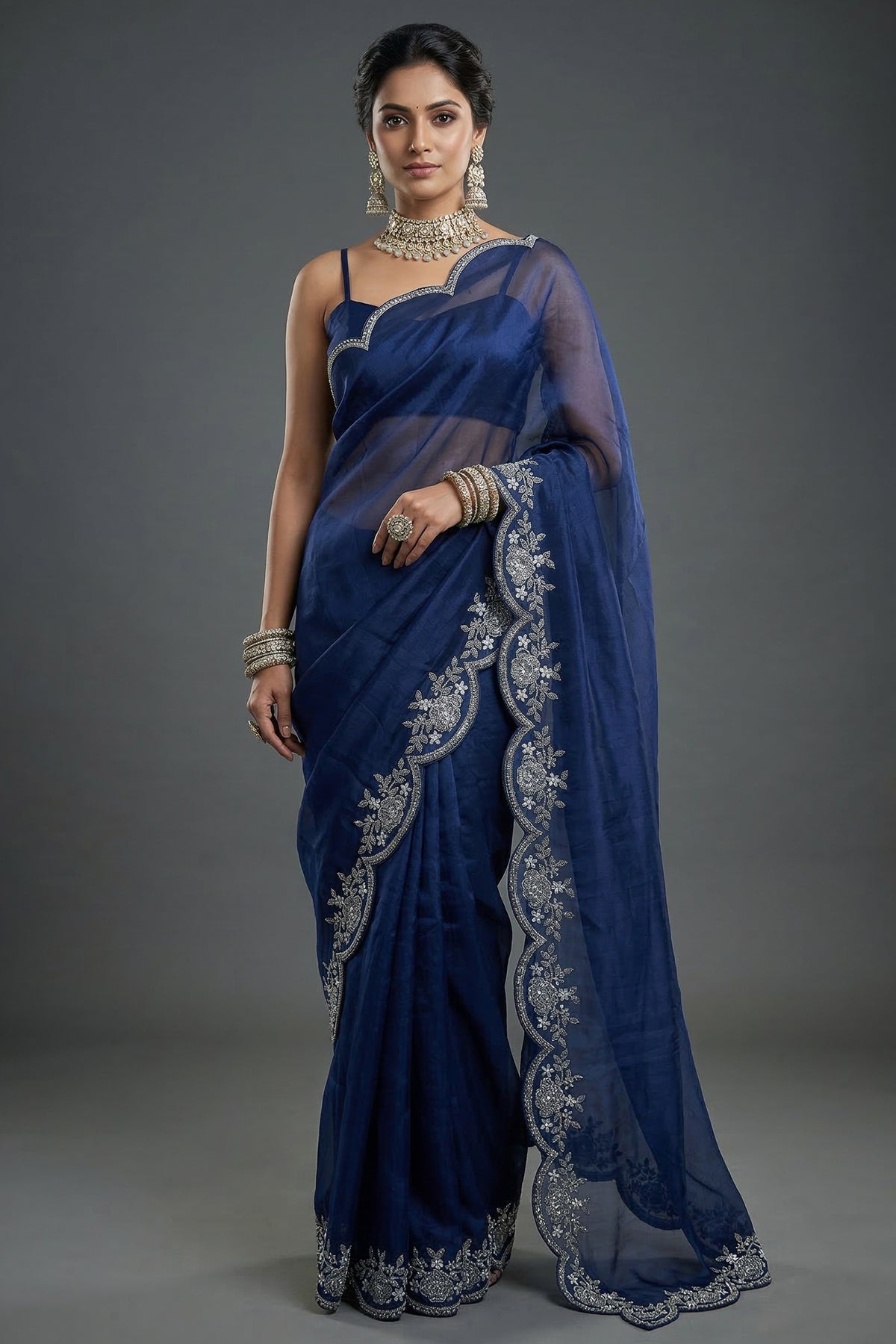 Blue Organza Solid Saree with Scalloped Zardosi Cutdana Worked Border and jacket-style Readymade Blouse