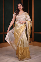Dual-Tone Silver Golden Tissue Saree Featuring Intricate Handwork Lace Border With Coordinated Heavy Blouse