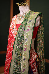 Purple and Red Silk Patola Saree with Traditional Ikat Motifs and Beads Applique Border