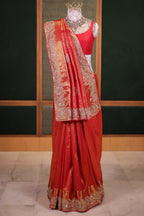 Bridal Red Metallic Kanchipuram Tissue Saree with Intricate Woven Zari and Handcrafted Zardosi and Sequin Embroidered Borders