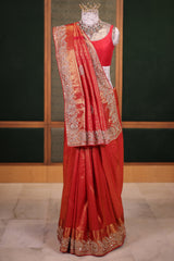 Bridal Red Metallic Kanchipuram Tissue Saree with Intricate Woven Zari and Handcrafted Zardosi and Sequin Embroidered Borders