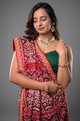 Red Silk Saree with Woven Patola and Handcrafted Cutdana and Bead Work Embroidery