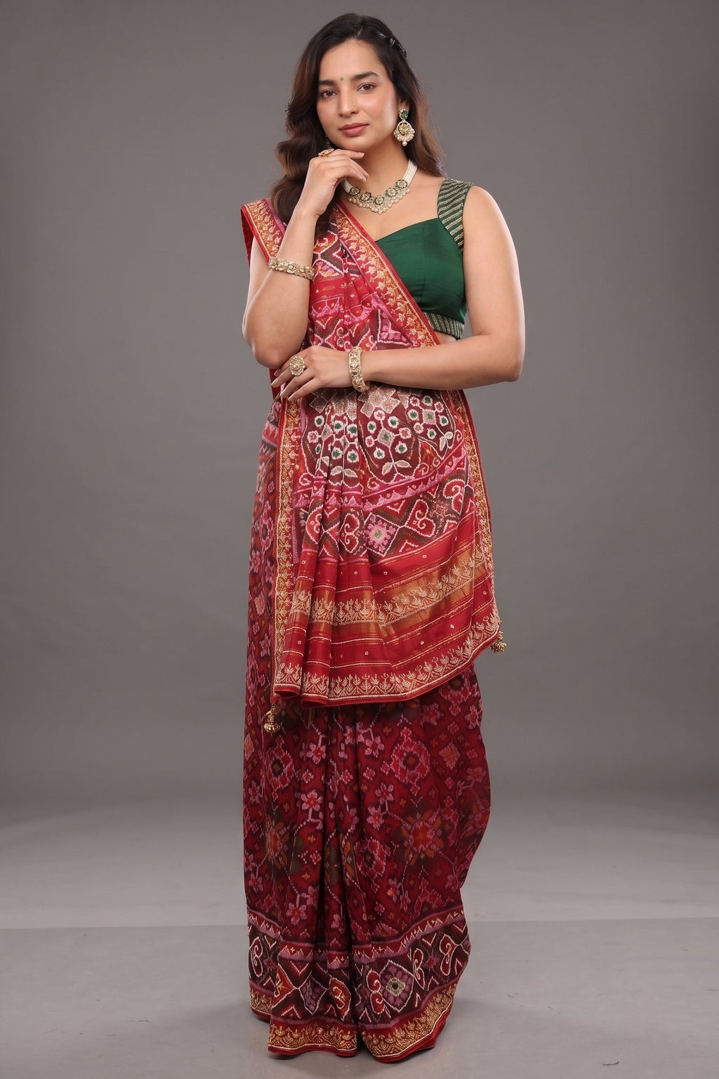 Red Silk Saree with Woven Patola and Handcrafted Cutdana and Bead Work Embroidery