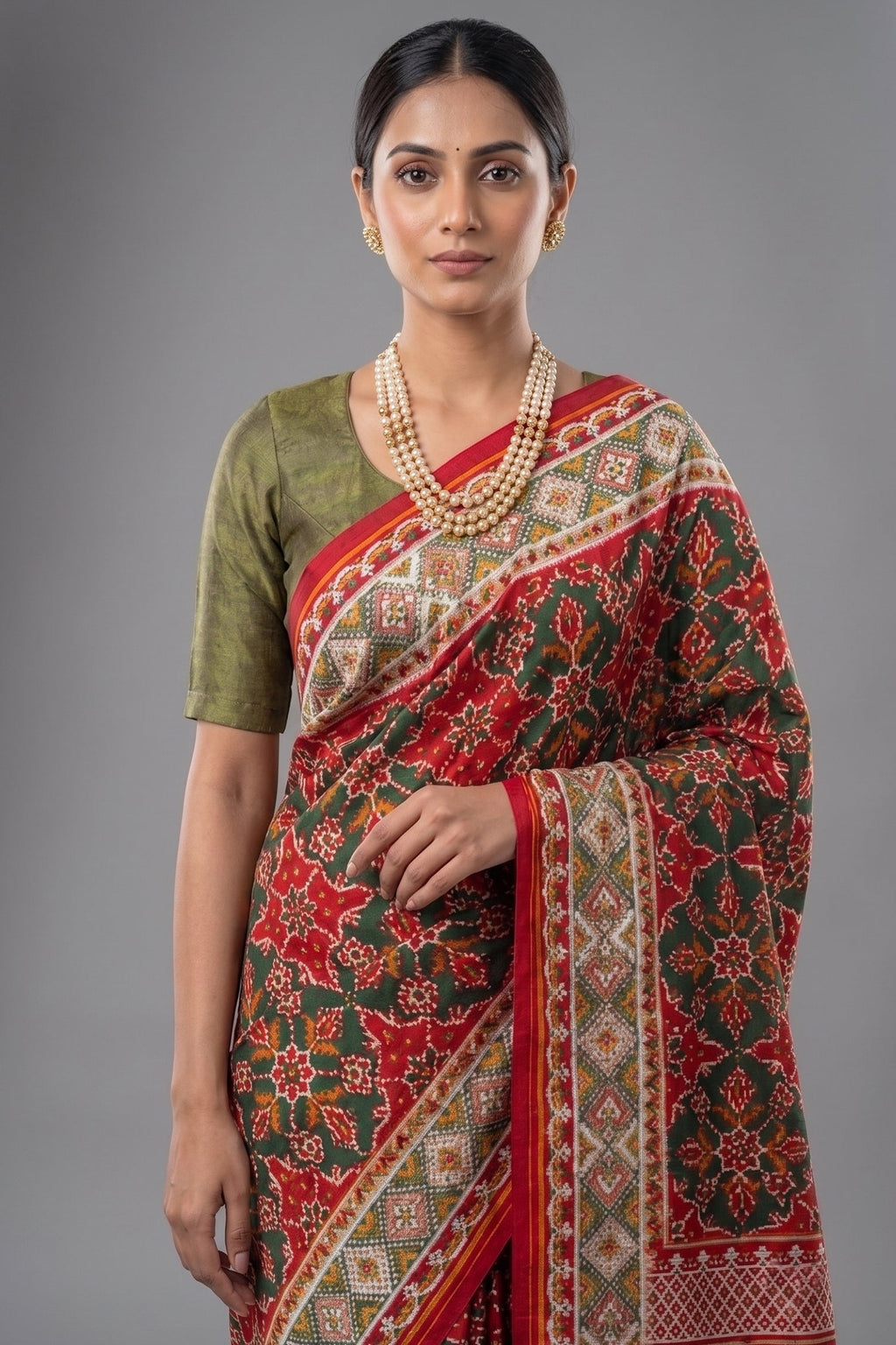 Green Silk Traditional Patola Weave Saree with Handwork