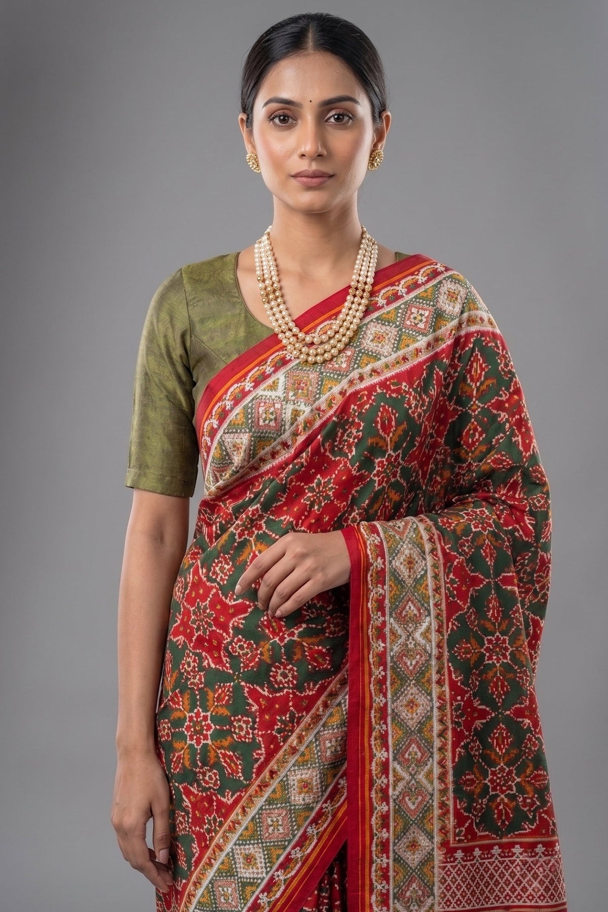Green Silk Traditional Patola Weave Saree with Handwork
